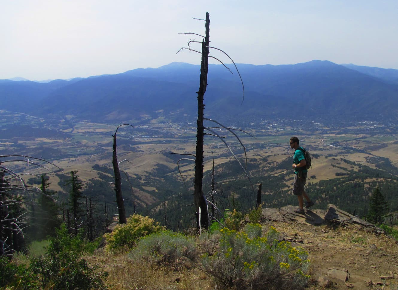 Hiker stops for a view on the Grizzly Peak Trail