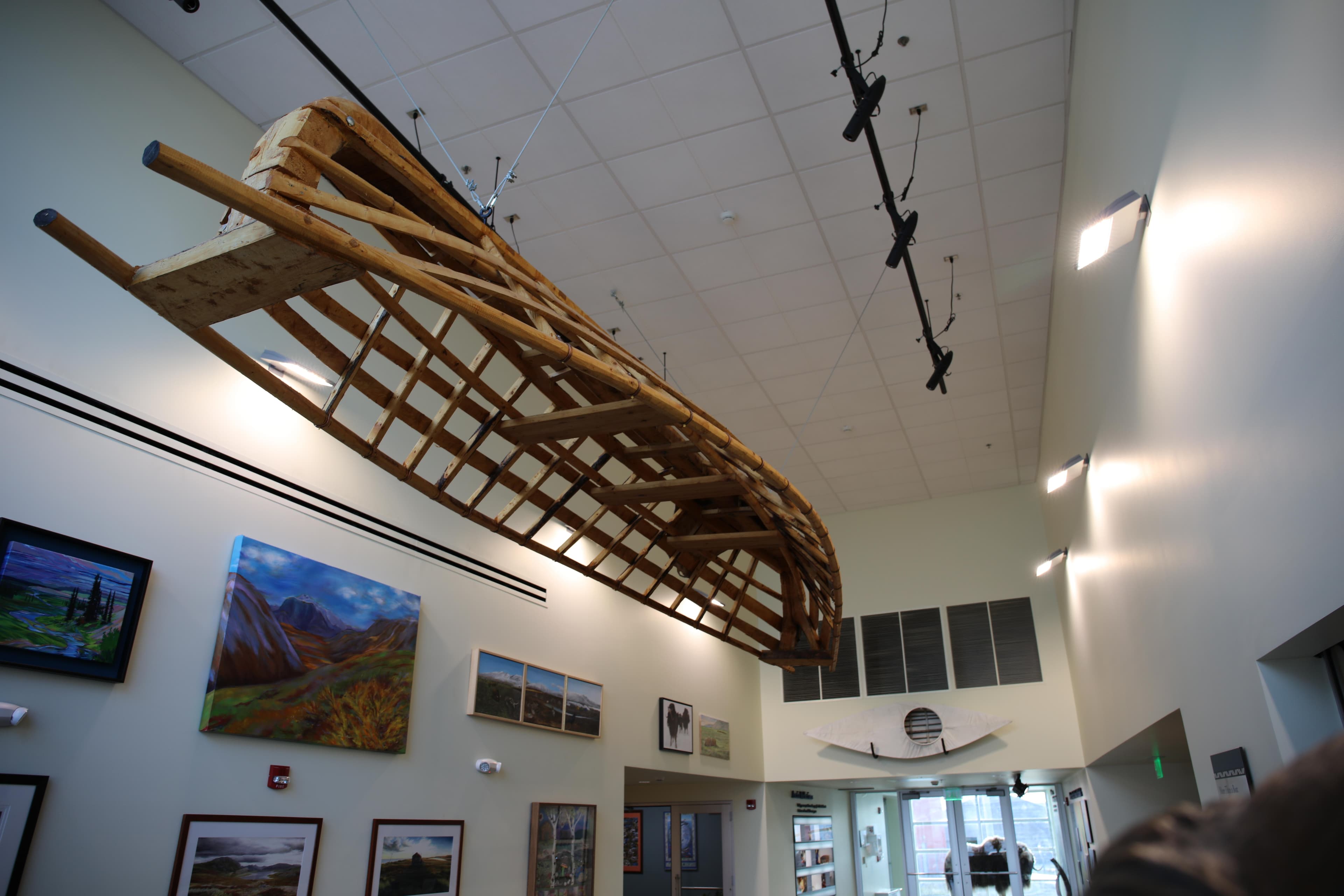 Umiaq and artwork at the Heritage Center