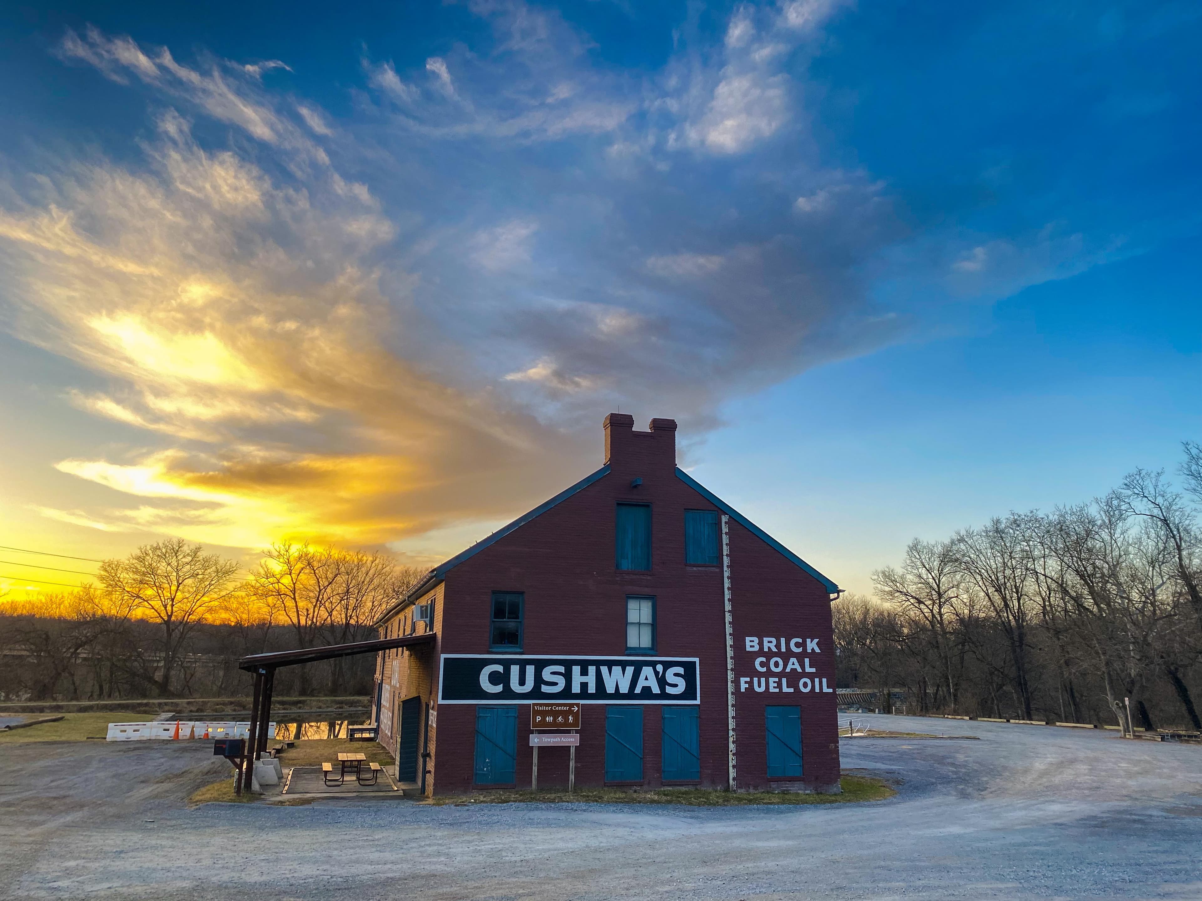 Sun setting over Cushwa Warehouse Visitor Center in Williamsport
