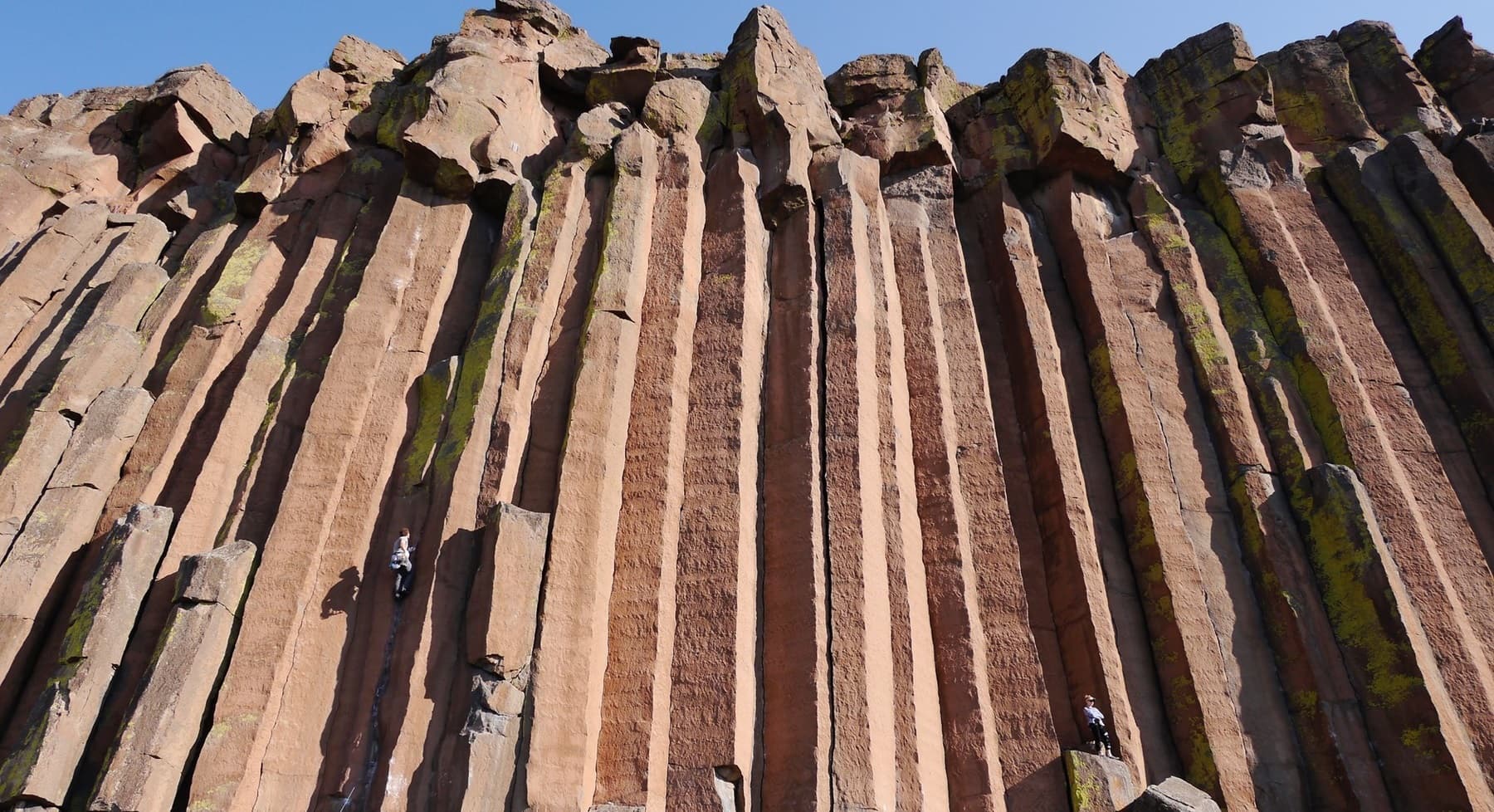 Climber on Columnar Basalt Cliffs of Trout Creek Climbing Area