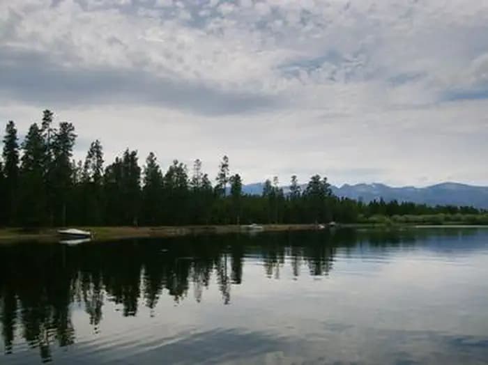 Hebgen Lake with boats along shoreline