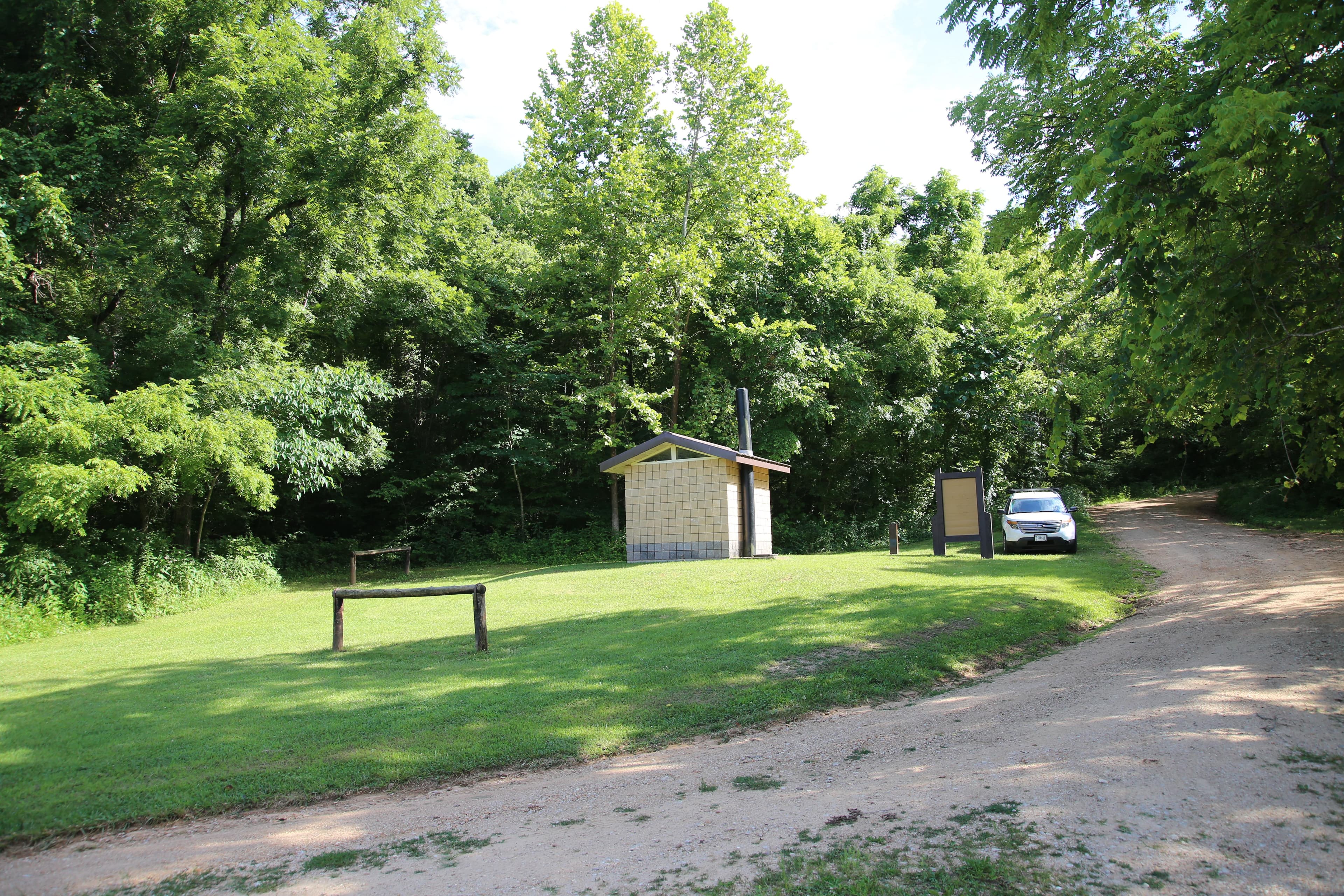 A vault toilet restroom can be found near the horse staging area, uphill from the campground.