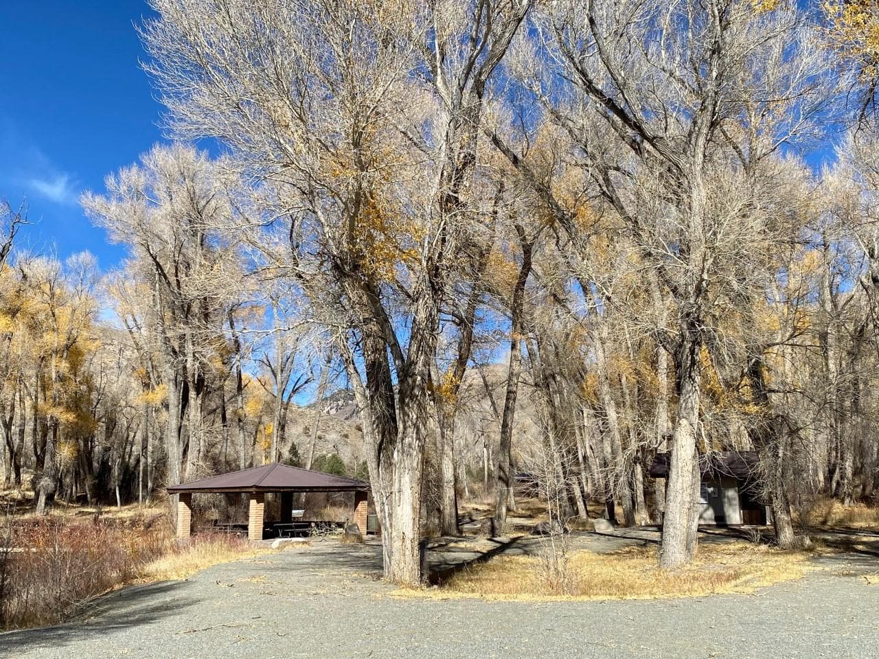 Parking area, picnic shelter and vault toilet.