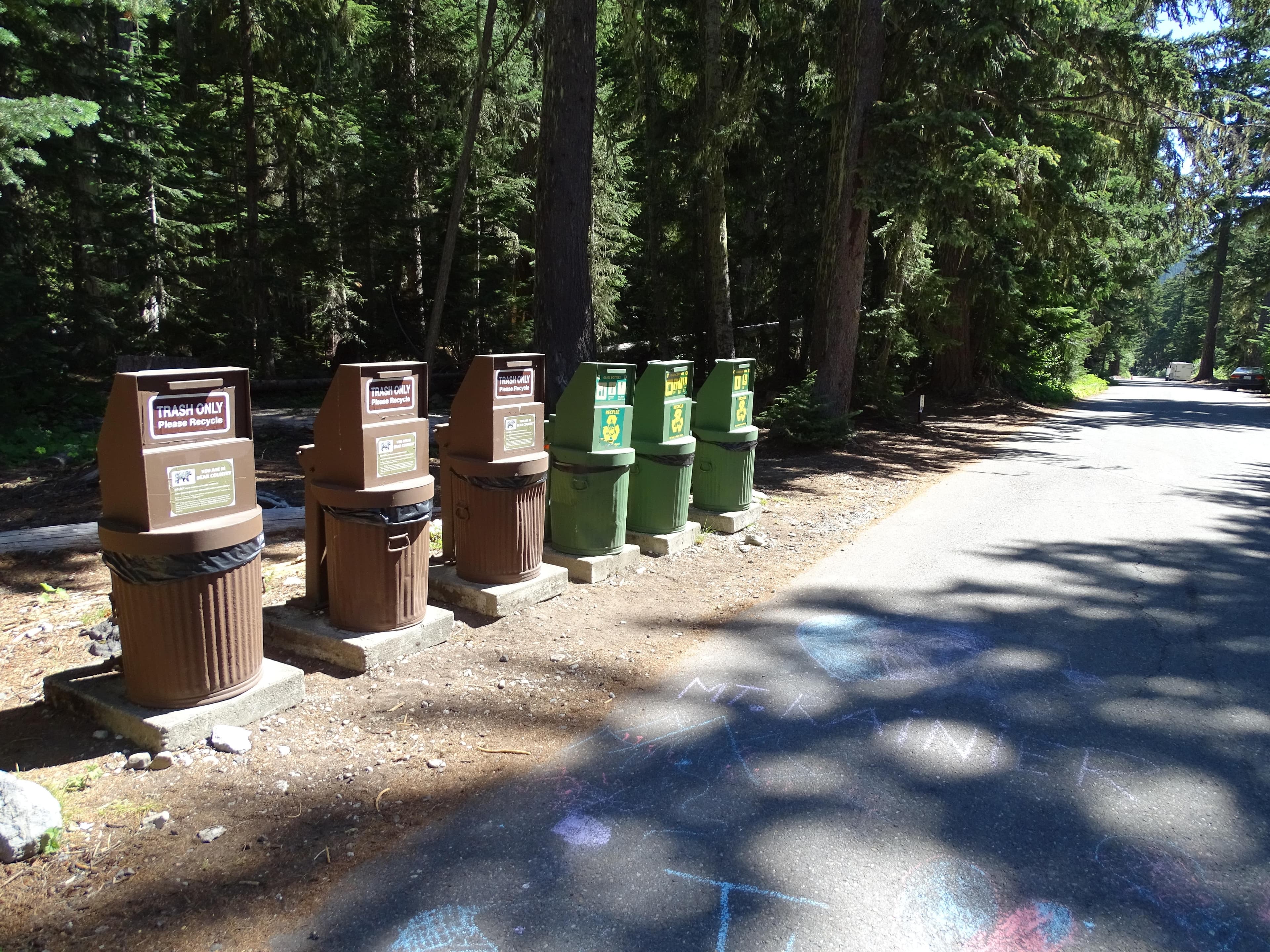 Trash and recycling bins are provided for campers.