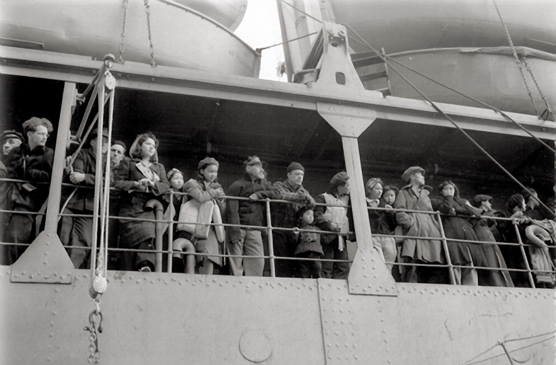 Pribilof villagers, here lining the railing of the USAT Delarof on the day of their departure (June 15, 1942), were evacuated with only a few hours notice and no idea of their ultimate destination.