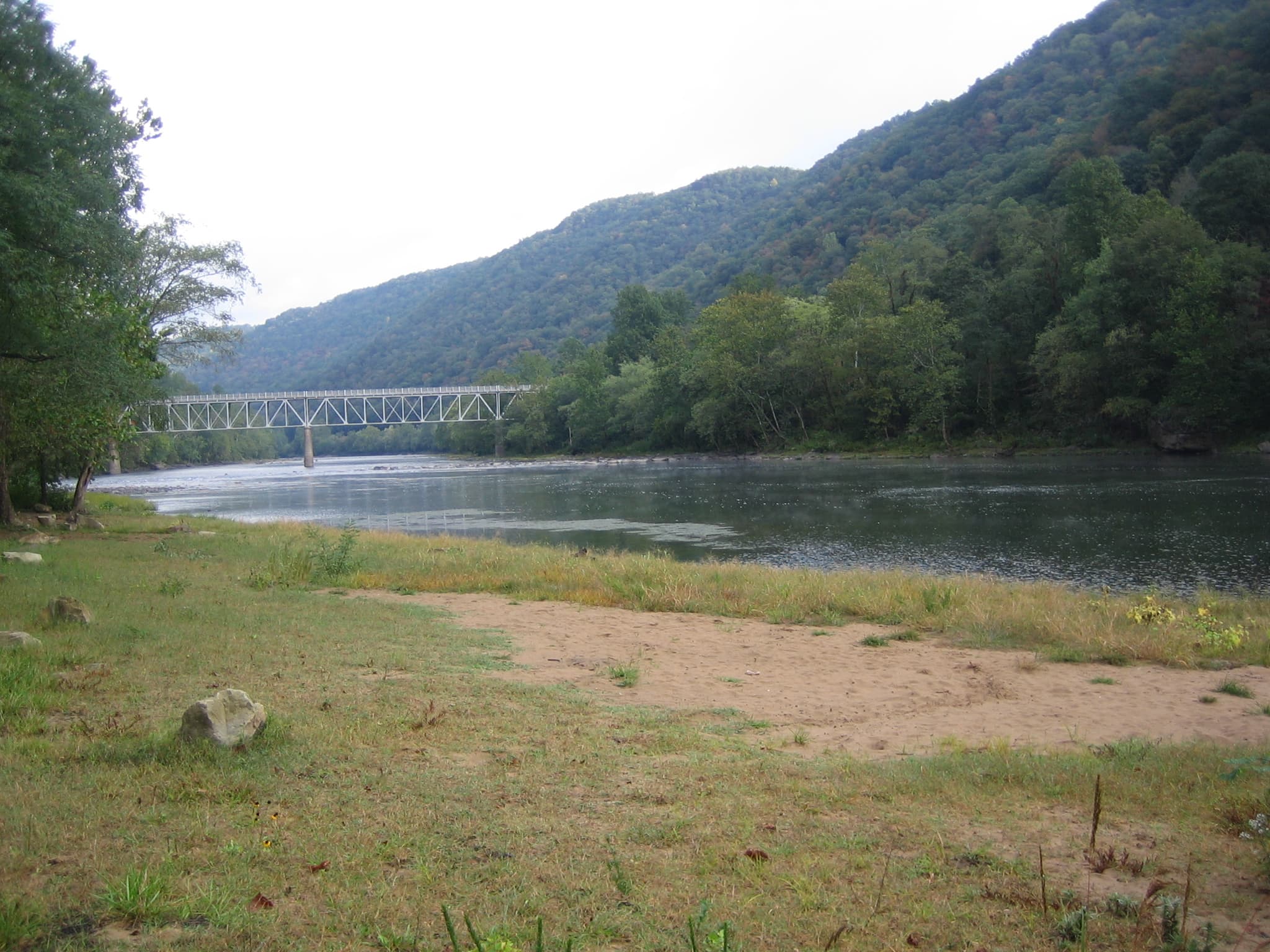 Stone Cliff Campground is located on the New River and offers opportunities for fishing, white water boating, and relaxation near your campsite.