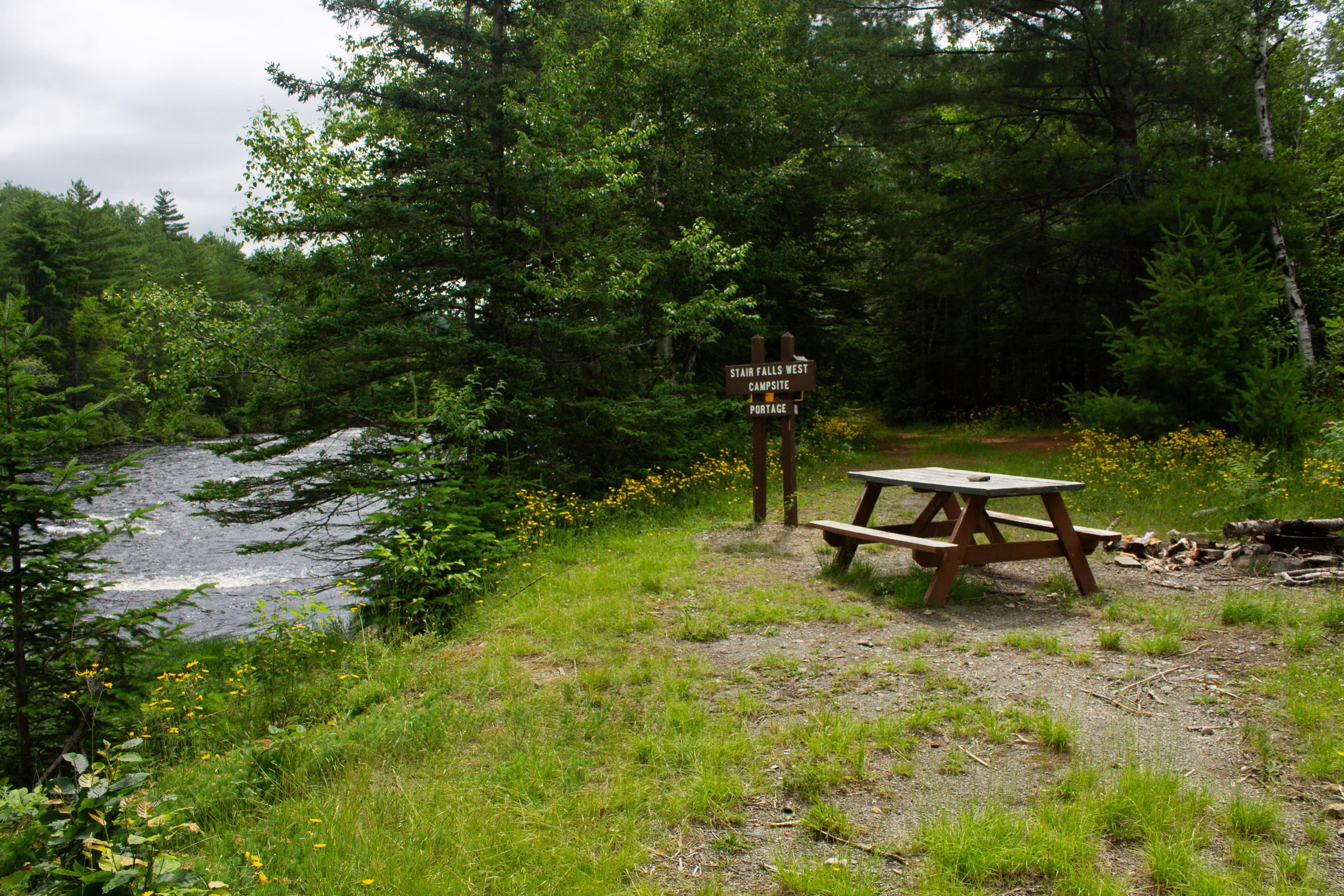 The Stair Falls West Campsite is located on the bank of the East Branch Penobscot River.