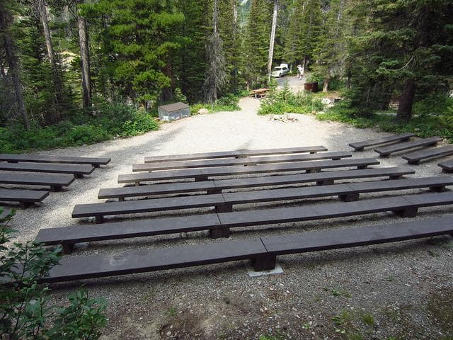 Attend an evening program at Two Medicine Campground Amphitheater