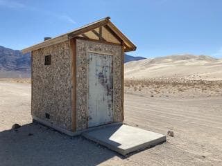 Eureka Dunes campground provides picnic tables, fire rings and a vault toilet