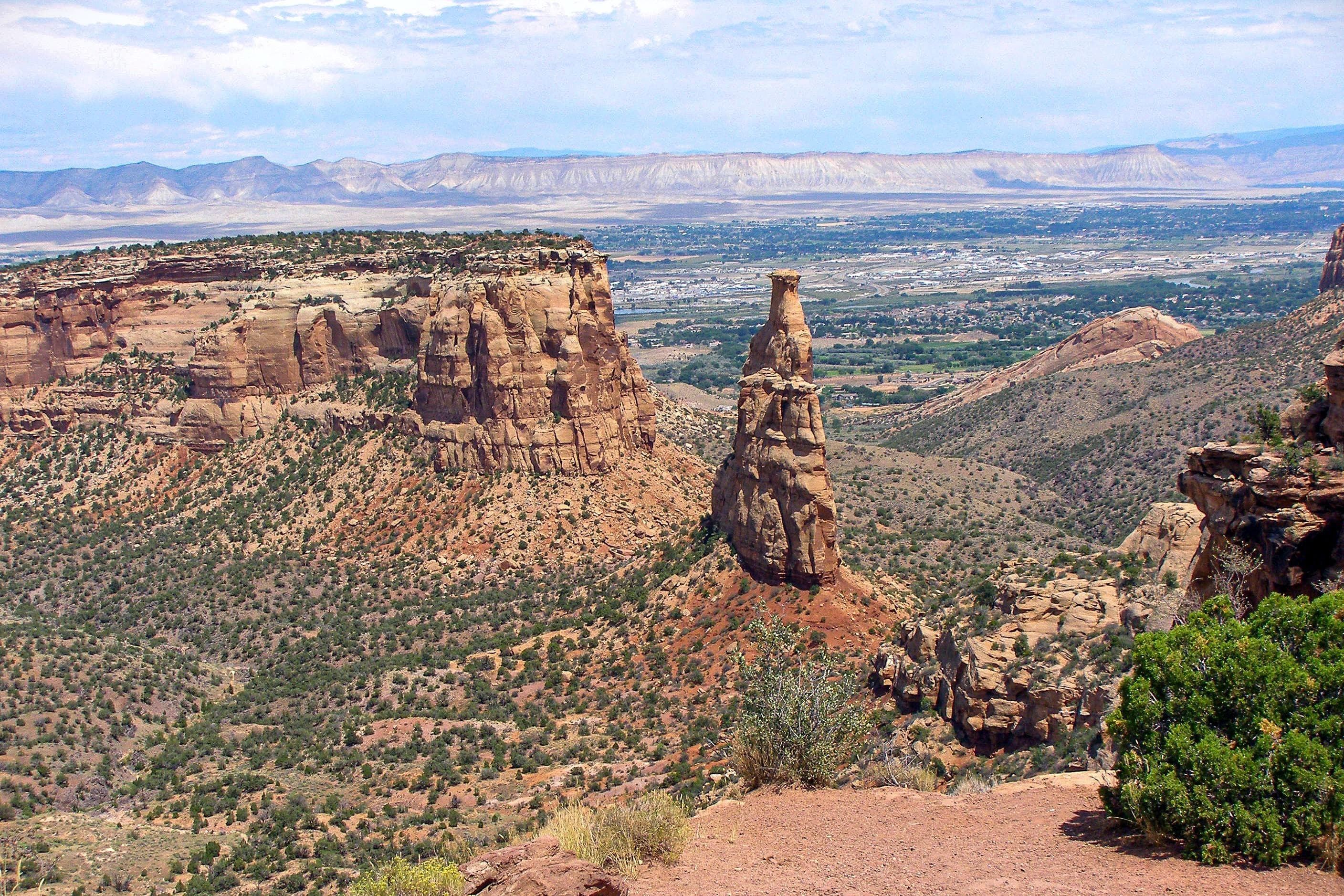 Independence Monument as seen from Rim Rock Drive is an icon of the larger national monument.