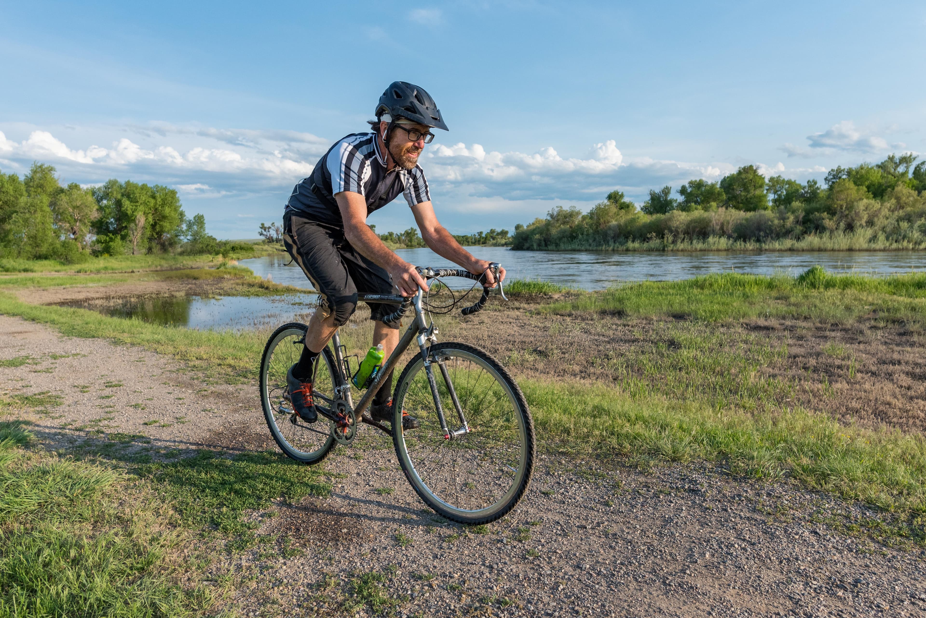Cyclist along the riverfront along the Lewis and Clark National Historic Trail