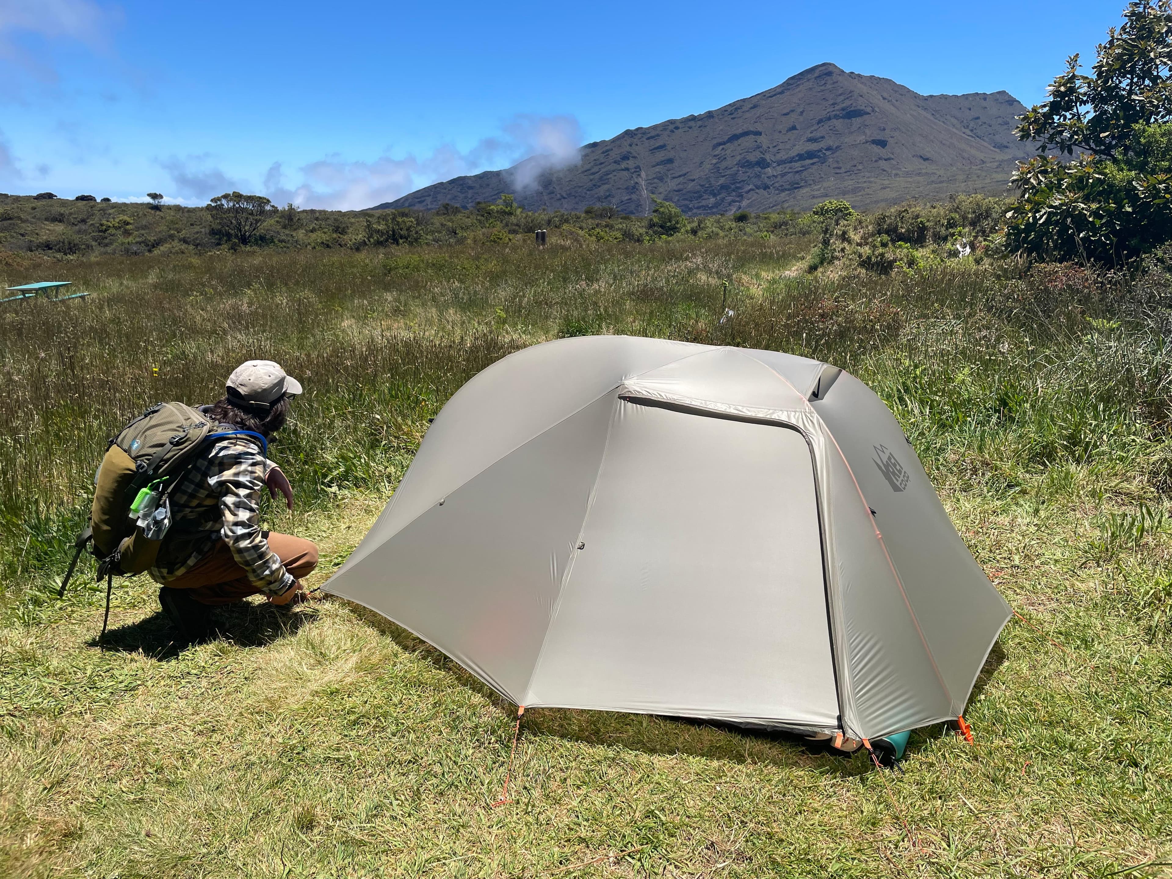 Palikū tent sites are located in a grassy field.