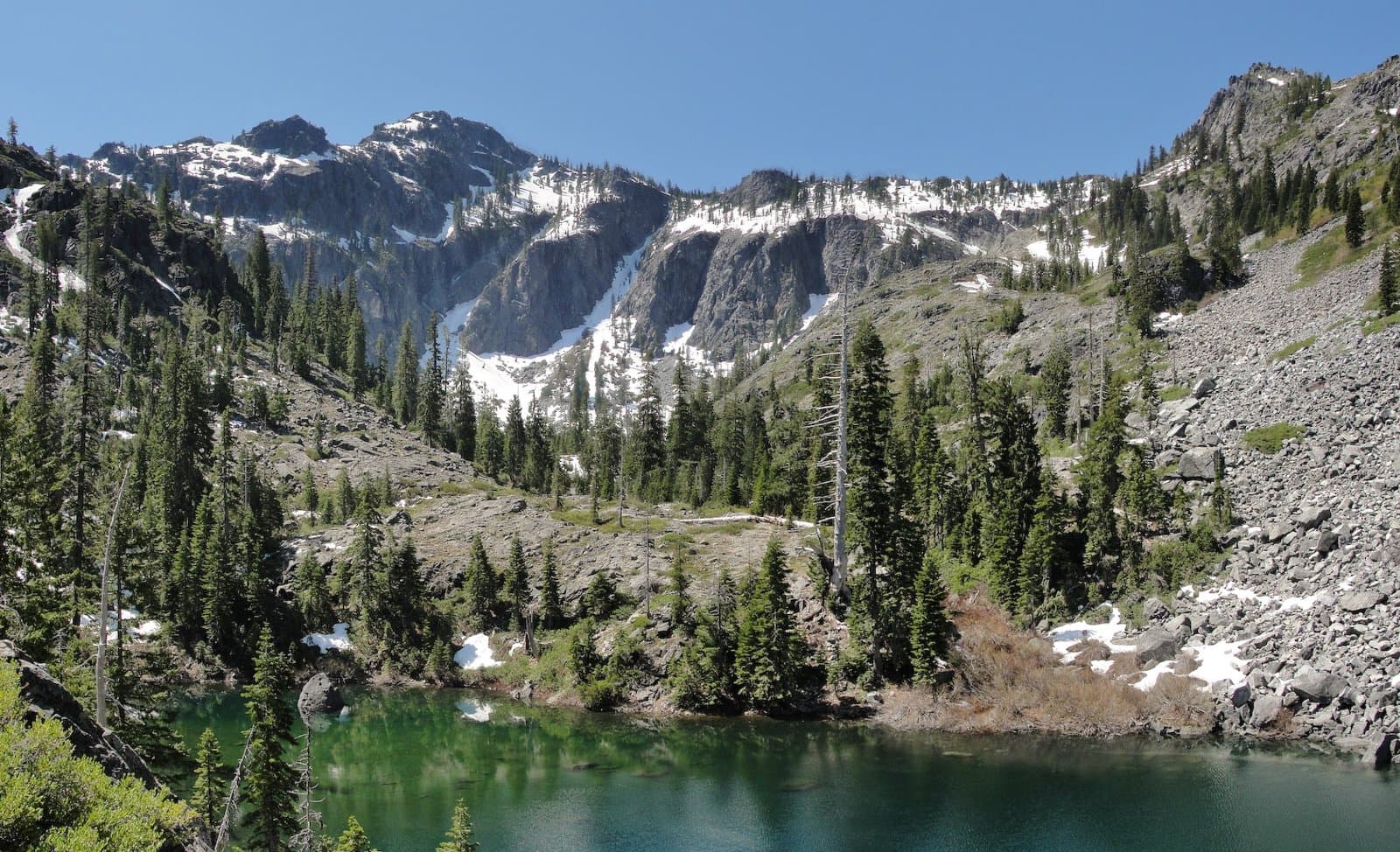 Bear Mountain and tarn below Devils Punchbowl in Siskiyou Wilderness